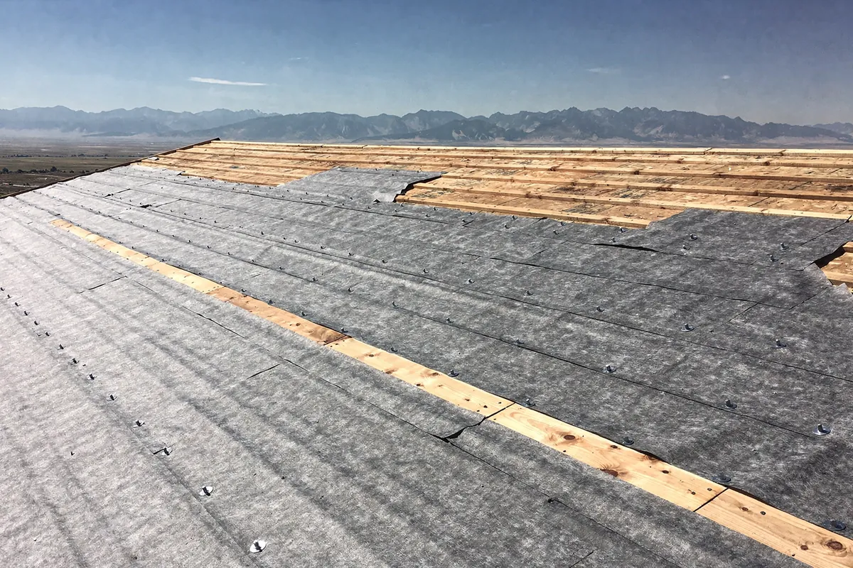 A Colorado roof deck covered in synthetic underlayment